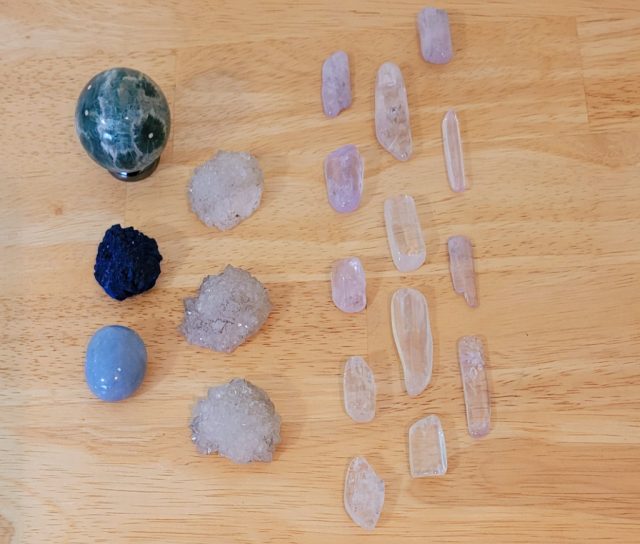 Example Crystal Grid to Ease Anxiety. Crystals and stones are lined up in columns